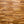Wooden wall panel with horizontal slats in various brown tones