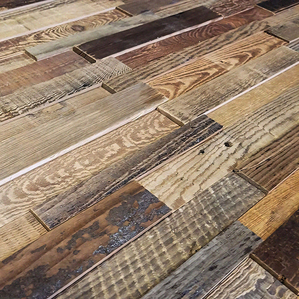 Close-up of a wooden floor with various shades of brown and gray.