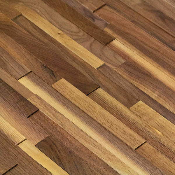 Close-up of wooden flooring with a herringbone pattern