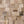 Pattern of wooden tiles with a mix of brown and beige tones.