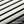 Close-up of real wood slats with a dark and light wood pattern.