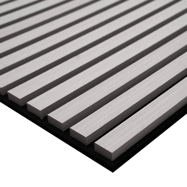 Close-up of a ribbed metal sheet with horizontal grooves on a white background