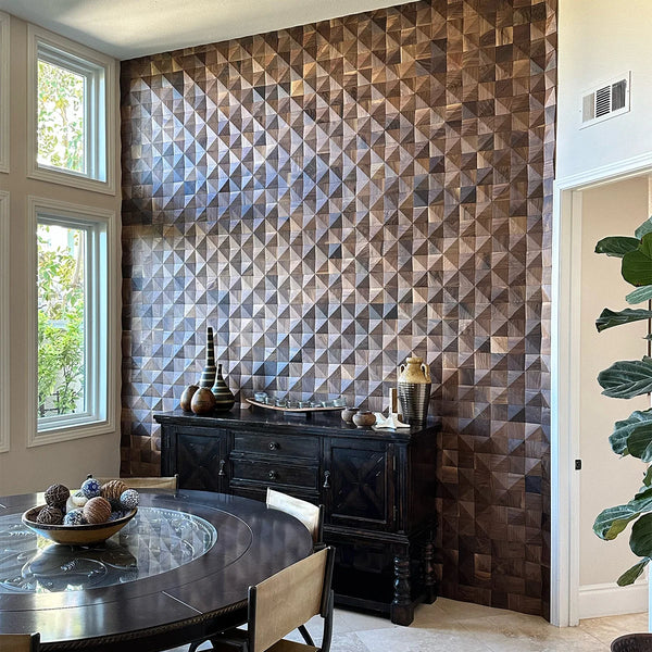 Dining room with geometric patterned wall and wooden furniture.