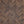 Wooden panel with a herringbone pattern in brown and beige tones.