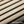 Close-up of real wood slats with a dark background