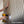 Person using a drill to install wooden paneling on a wall with 'Easy Installation' text.