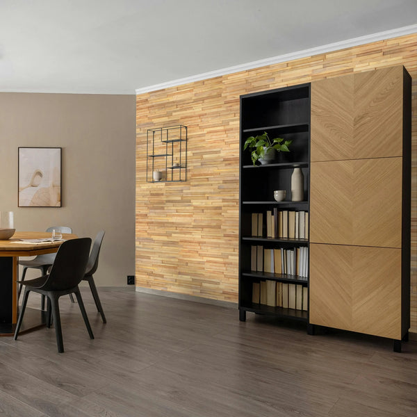 Modern interior with wooden wall paneling, bookshelf, and dining table.