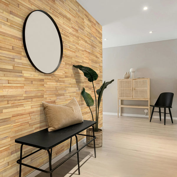 Modern interior with wooden wall, black bench, and decorative items.