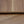 Close-up of wooden flooring panels with a visible joint.